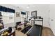 Workout room features a fan and plenty of workout equipment including a treadmill at 1227 Cosmos Rd, Summerville, SC 29483