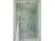 Close-up of a shower featuring blue and green decorative tile and glass door at 1429 Burningtree Rd, Charleston, SC 29412