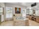 Bathroom with tile floors, a jetted tub, and and sinks with a vanity at 1429 Burningtree Rd, Charleston, SC 29412