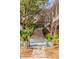 Beautiful exterior staircase with brick accents and lush greenery, leading to a charming home entrance at 1429 Burningtree Rd, Charleston, SC 29412