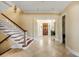 Inviting foyer featuring a staircase, tile floors, and elegant design at 1429 Burningtree Rd, Charleston, SC 29412