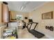 Bright laundry/exercise room with modern washer/dryer and exercise equipment at 1429 Burningtree Rd, Charleston, SC 29412