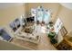Grand living room with tile floors, large windows, and a view of the pool at 1429 Burningtree Rd, Charleston, SC 29412