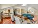 Open living area with skylight, hardwood floors, and game area at 1429 Burningtree Rd, Charleston, SC 29412