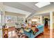 Bright living area with stylish furniture, skylight, and hardwood floors at 1429 Burningtree Rd, Charleston, SC 29412