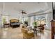 Spacious main bedroom with tile floors and access to an outdoor balcony overlooking a green space at 1429 Burningtree Rd, Charleston, SC 29412