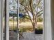 View of a lush green golf course from the stone patio at 1429 Burningtree Rd, Charleston, SC 29412