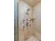 Close up of shower with tile surround, multiple shower heads, and a corner shelf at 1429 Burningtree Rd, Charleston, SC 29412