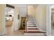 Staircase with wooden steps and white risers, leading to the upper level at 1429 Burningtree Rd, Charleston, SC 29412