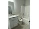 Bathroom with a shower-tub combo, white fixtures, and a vanity with a granite countertop at 149 Rose Ave, Walterboro, SC 29488