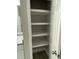 Bathroom features a large open linen closet with four shelves perfect for storing linens and toiletries at 149 Rose Ave, Walterboro, SC 29488