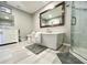 Modern bathroom with soaking tub, walk-in shower, and tiled floors at 1545 Ashley River Rd # 3K, Charleston, SC 29407
