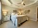 Comfortable main bedroom features carpeted floors, ceiling fan, and natural light at 1545 Ashley River Rd # 3K, Charleston, SC 29407