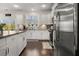 Bright kitchen with stainless steel appliances, granite countertops, and ample cabinet space at 1549 Moss Spring Rd, Mount Pleasant, SC 29466