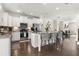 Bright, open kitchen with granite island, stainless appliances and access to living spaces at 1549 Moss Spring Rd, Mount Pleasant, SC 29466
