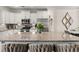 Bright, open kitchen with granite island, stainless appliances, and ample cabinet space at 1549 Moss Spring Rd, Mount Pleasant, SC 29466