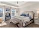 The main bedroom features large windows, tray ceilings, neutral paint colors, and a well-designed layout at 1549 Moss Spring Rd, Mount Pleasant, SC 29466