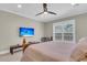 Bedroom featuring neutral walls, ceiling fan, and large window providing natural light at 1855 Halle Rd, Johns Island, SC 29455