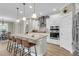Modern kitchen with stainless steel appliances, granite countertops, and a large center island with seating at 1855 Halle Rd, Johns Island, SC 29455
