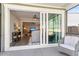Patio with comfortable seating, a view into the home, and sliding glass doors at 1855 Halle Rd, Johns Island, SC 29455