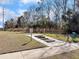 Community walking trail featuring exercise steps, lush greenery, and clear signage at 1855 Halle Rd, Johns Island, SC 29455