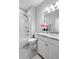 Well lit bathroom featuring white vanity with marble countertop and shower-tub combo at 1918 Essex Farms Dr, Charleston, SC 29414