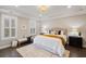 Bedroom showcasing natural light, a cozy bench, decorative pillows, and a stylish light fixture at 1918 Essex Farms Dr, Charleston, SC 29414
