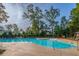 Gathering-friendly community pool with ample seating and lounge chairs for relaxing in the sun at 1918 Essex Farms Dr, Charleston, SC 29414