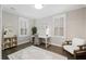 Cozy home office space with natural light, neutral colors, and hardwood floors at 1918 Essex Farms Dr, Charleston, SC 29414