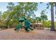 Picturesque playground with modern equipment, located near mature trees for shade and a pavilion nearby at 1918 Essex Farms Dr, Charleston, SC 29414