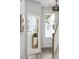 Inviting entryway with natural light, white trim and light wood flooring at 211 Abercom Place Dr, Moncks Corner, SC 29461