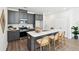Well-equipped kitchen with stainless steel appliances, ample counter space, and island seating at 211 Abercom Place Dr, Moncks Corner, SC 29461