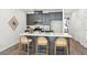 Well-equipped kitchen with stainless steel appliances, ample counter space, and island seating at 211 Abercom Place Dr, Moncks Corner, SC 29461