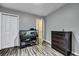 Bedroom with a closet, a fish tank, light-gray walls, and wood-look floors at 201 Maple Dr, Summerville, SC 29485