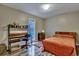 Bedroom featuring a bed and a desk with many plants at 201 Maple Dr, Summerville, SC 29485