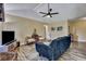Comfortable living room with stylish decor, a ceiling fan, and neutral colors at 201 Maple Dr, Summerville, SC 29485