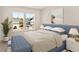 Comfortable bedroom featuring a large window and stylish blue accents at 202 Belfort Pl, Summerville, SC 29486