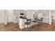 Stylish kitchen with an island, bar seating, and plenty of cabinet storage at 202 Belfort Pl, Summerville, SC 29486