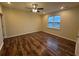 Cozy bedroom with a ceiling fan, a window, and stylish flooring at 2100 Booker St, Charleston, SC 29405