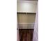 Walk-in closet featuring a closet rod, storage cubbies, and wood-look floors at 2100 Booker St, Charleston, SC 29405
