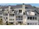 Close up on multiple balconies facing the wooded area at 2333 Tall Sail Dr # G 607, Charleston, SC 29414