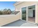 This balcony has a sliding glass door leading into the main bedroom, offering tranquil outdoor and indoor living at 2333 Tall Sail Dr # G 607, Charleston, SC 29414