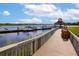 View of the community dock on the water with seating at 2333 Tall Sail Dr # G 607, Charleston, SC 29414