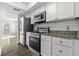 The home has a modern kitchen with stainless steel appliances at 2333 Tall Sail Dr # G 607, Charleston, SC 29414