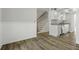 Cozy kitchen with staircase and hardwood floors at 2333 Tall Sail Dr # G 607, Charleston, SC 29414