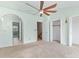 Spacious bedroom with ceiling fan and neutral color palette, offering a serene retreat with walk-in closet at 2333 Tall Sail Dr # G 607, Charleston, SC 29414