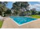A lovely pool with a large sundeck surrounded by mature trees and ample seating at 2333 Tall Sail Dr # G 607, Charleston, SC 29414