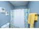 Bathroom with decorative shower curtain and fixtures at 240 Horseshoe Dr, Goose Creek, SC 29445