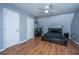 Bedroom with gray walls, a ceiling fan, and dark-stained wood flooring at 240 Horseshoe Dr, Goose Creek, SC 29445