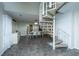 Bright dining area features spiral staircase, neutral walls and tile floors at 240 Horseshoe Dr, Goose Creek, SC 29445